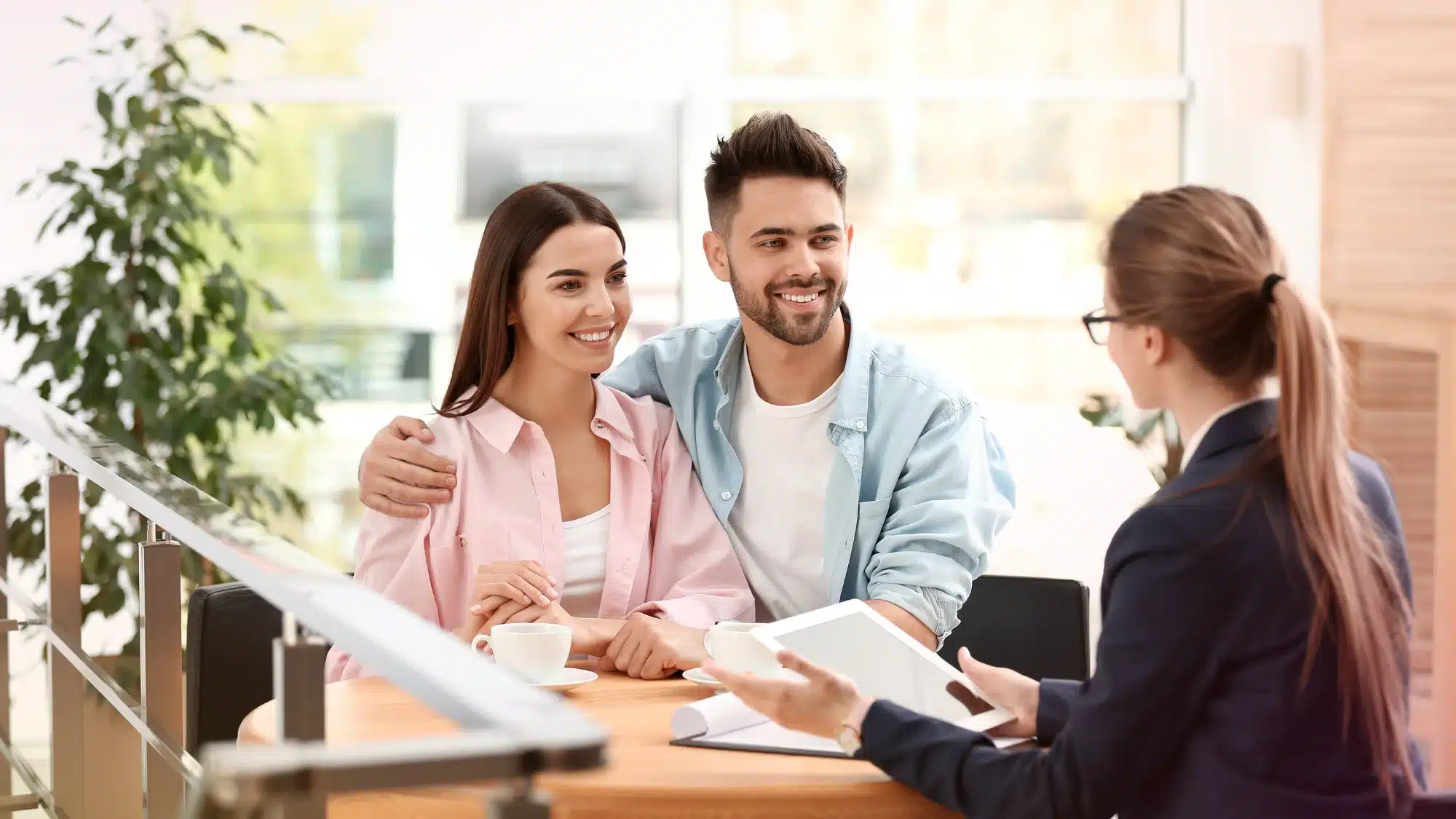 insurance agent helping individuals choose the right coverage options by explaining policies and comparing insurance plans