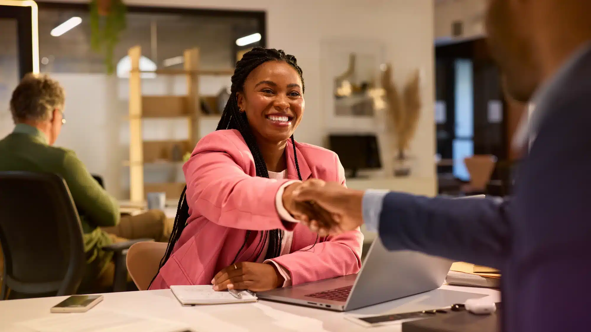 Insurance professional reviewing a client’s existing policies to identify coverage gaps and recommend additional protection