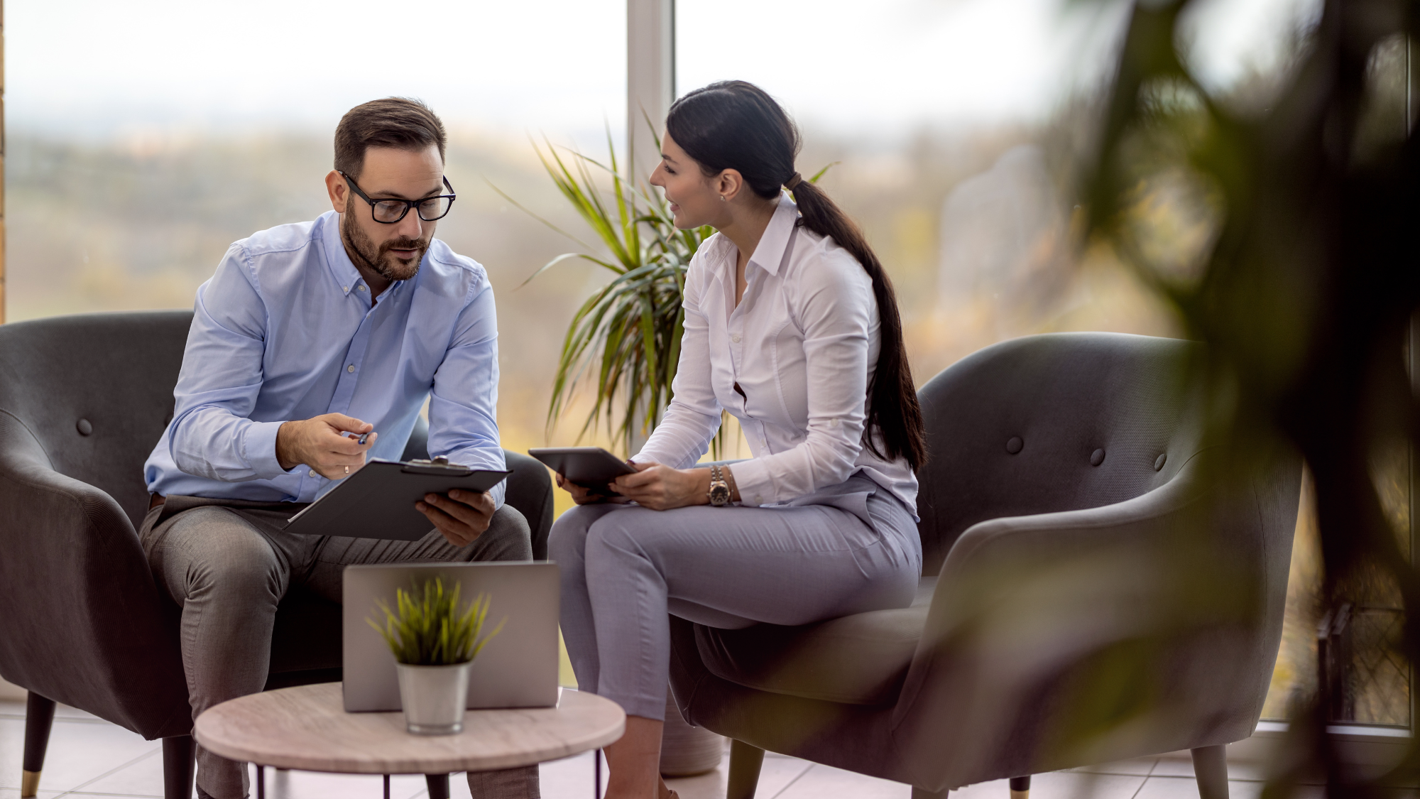 Experienced agents at Newington CT Insurance Agency comparing coverage options.