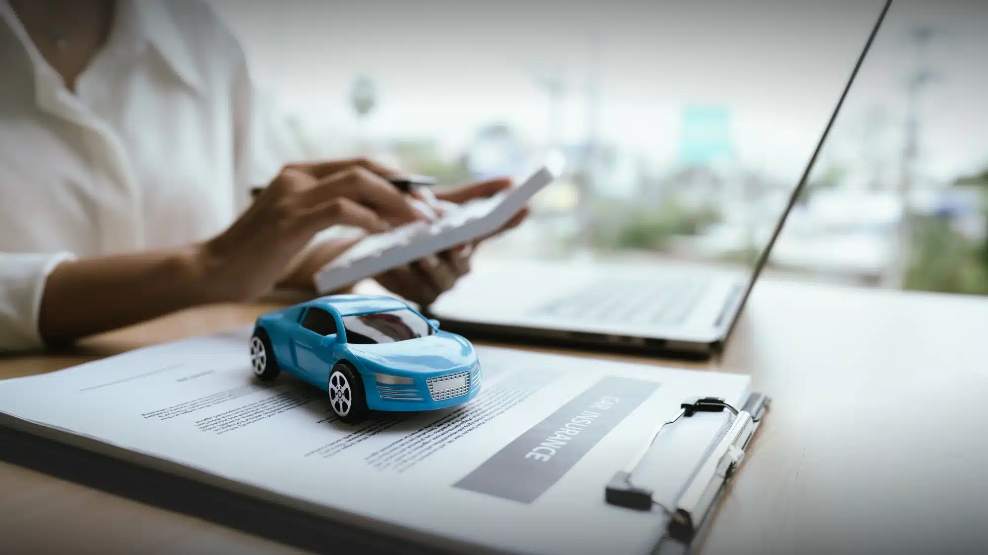 Connecticut drivers discussing auto insurance coverage in Newington