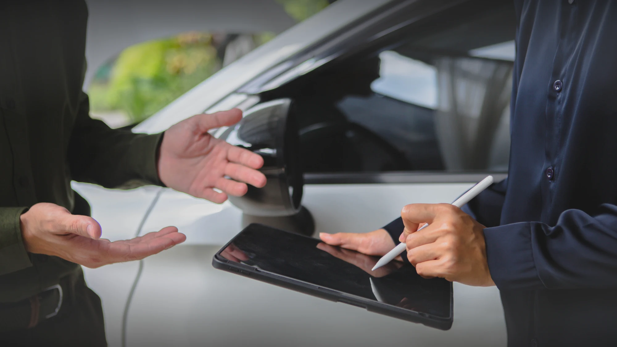 Insurance agent reviewing uninsured motorist coverage with a Connecticut driver
